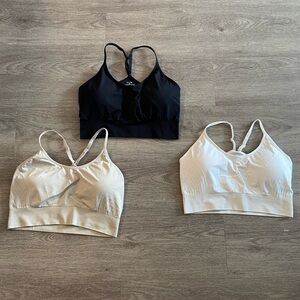 Set of Three Sports Bras in Black, White, and Cream